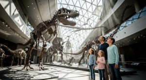 A family enjoys the Royal Ontario Museum, one of the attractions included in a Toronto CityPASS review.