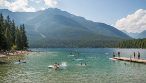 People enjoying a beautiful Whistler summer day at a lake.